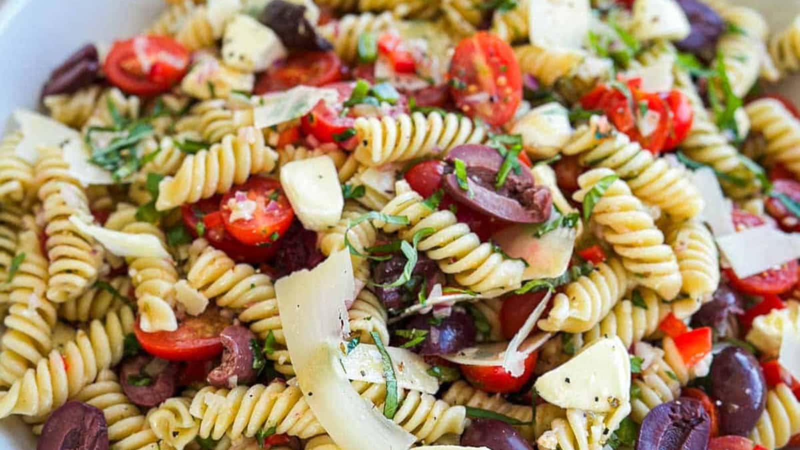 Italian pasta salad mixed with vegetables and light dressing.