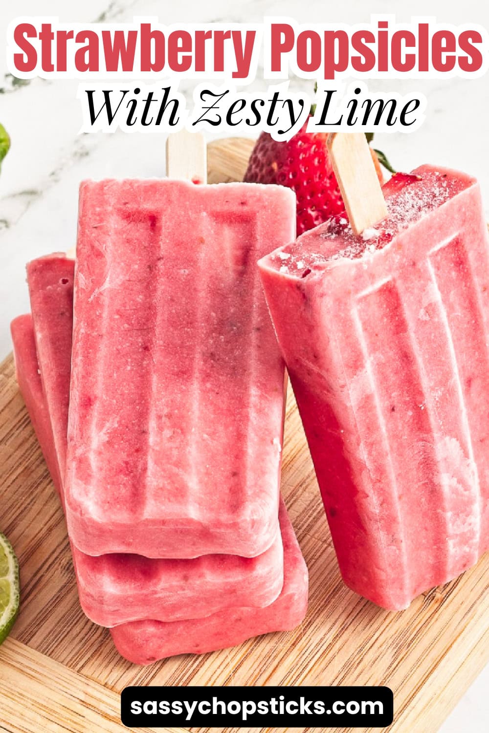 Strawberry popsicles with zesty lime made with fresh strawberries and coconut milk, an easy healthy frozen summer treat.