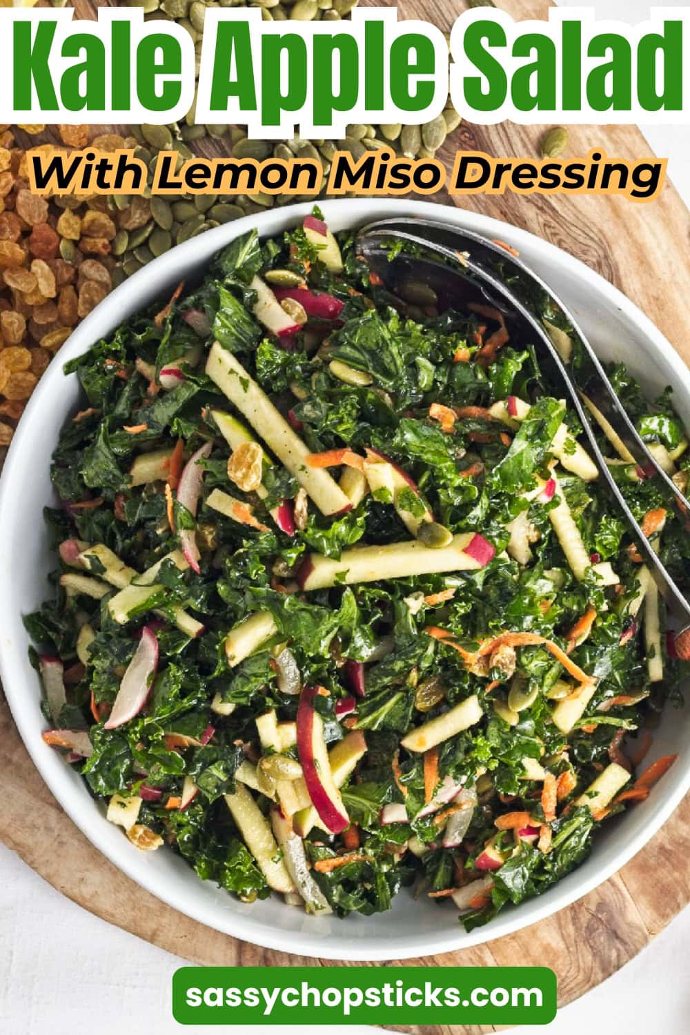 Kale Apple Salad with Lemon Miso Dressing-fresh kale, crunchy apples, carrots, pumpkin seeds, and raisins in a flavorful homemade dressing.