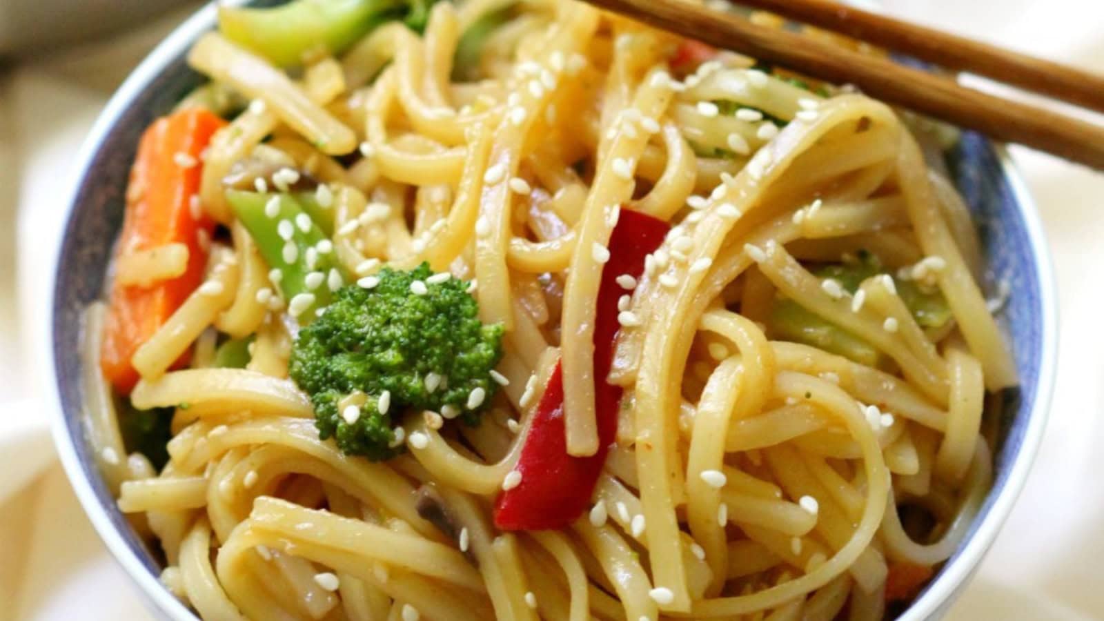 Gluten-free vegetable noodles stir-fried with colorful vegetables.