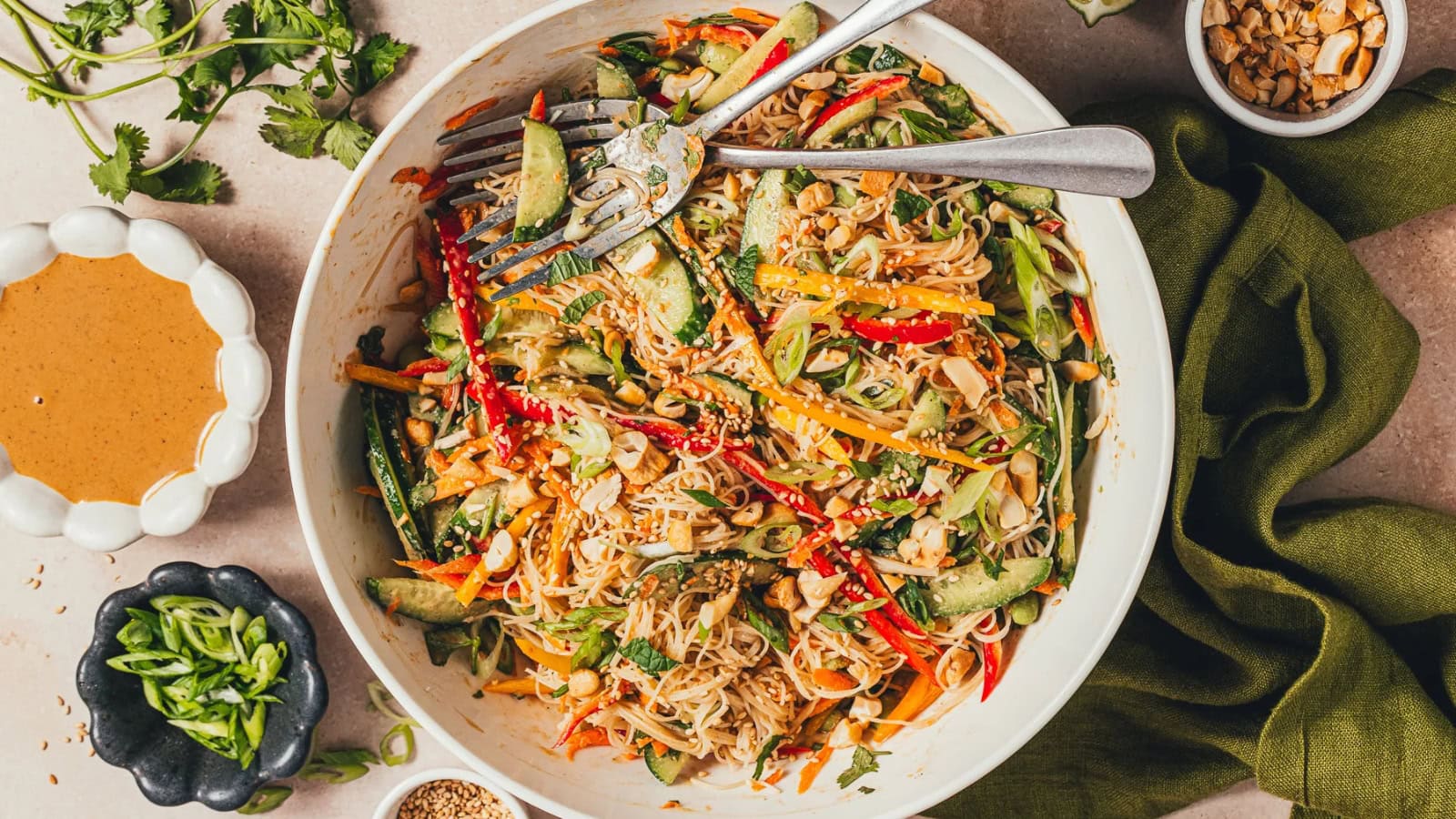 Chilled rice vermicelli salad tossed with vegetables and creamy tahini dressing.
