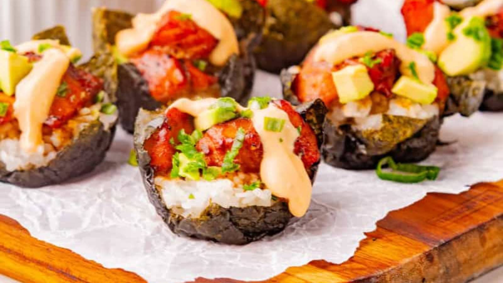 Crispy sushi cups filled with baked salmon and seasoned rice.