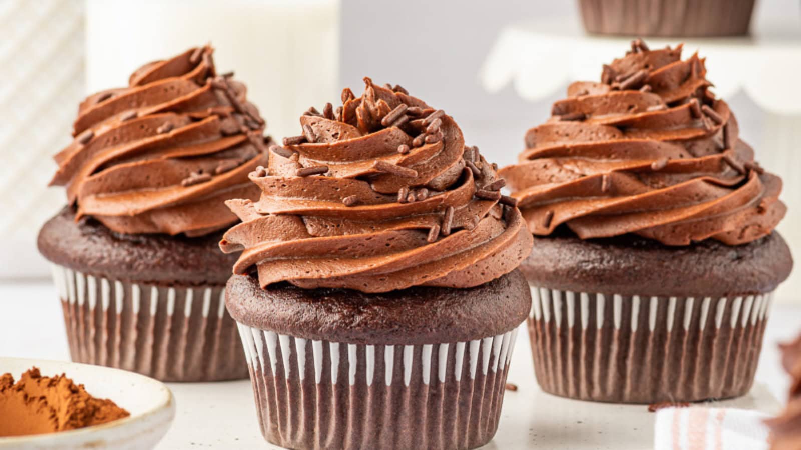 Decadent gluten-free chocolate cupcakes finished with creamy frosting.
