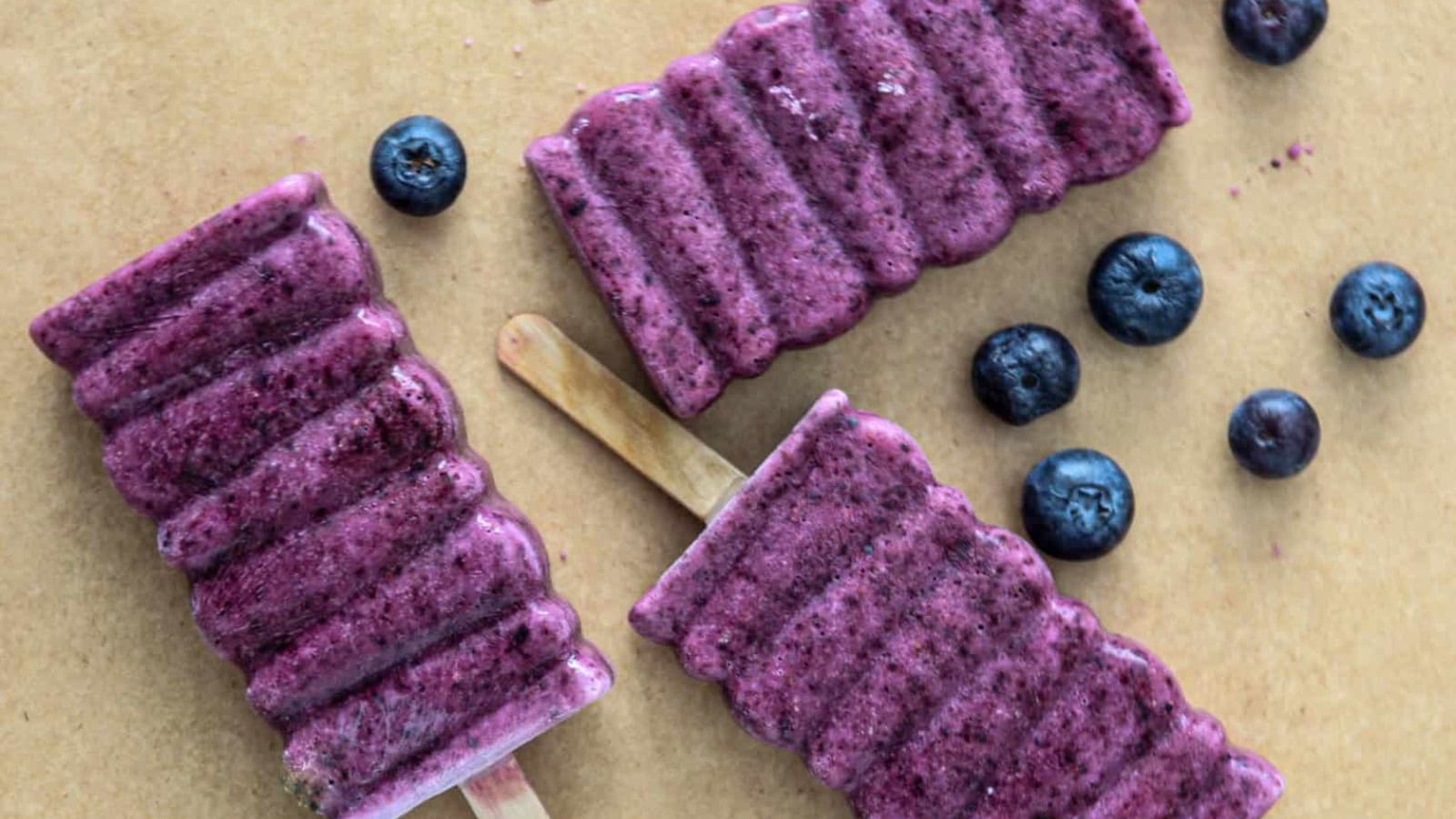 Homemade blueberry popsicles bursting with fresh berry flavor.