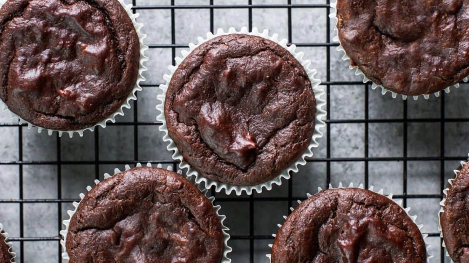 Grain-free cupcakes topped with creamy sweet potato frosting.