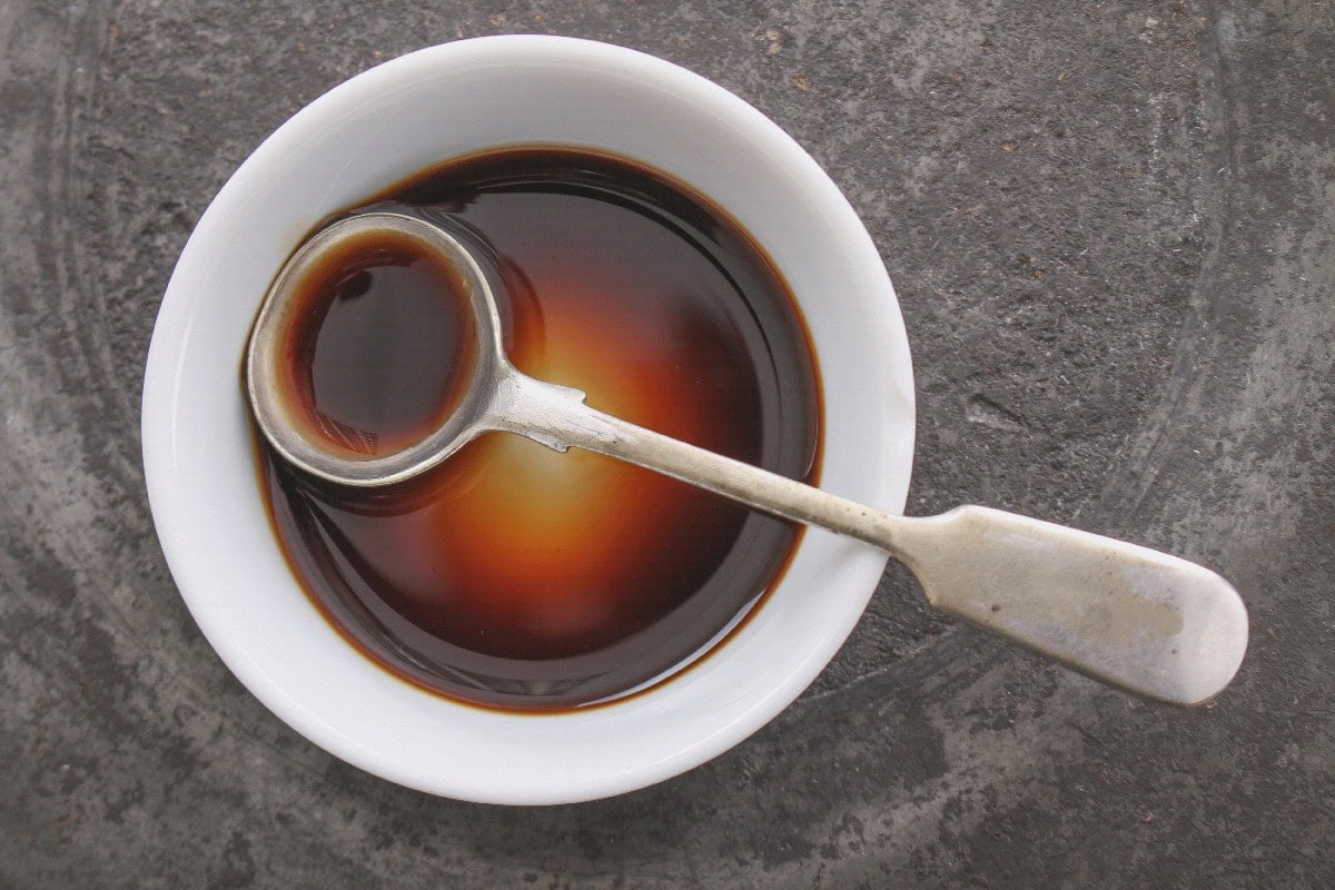 Worcestershire sauce in a small bowl as a Chinese black vinegar substitute.