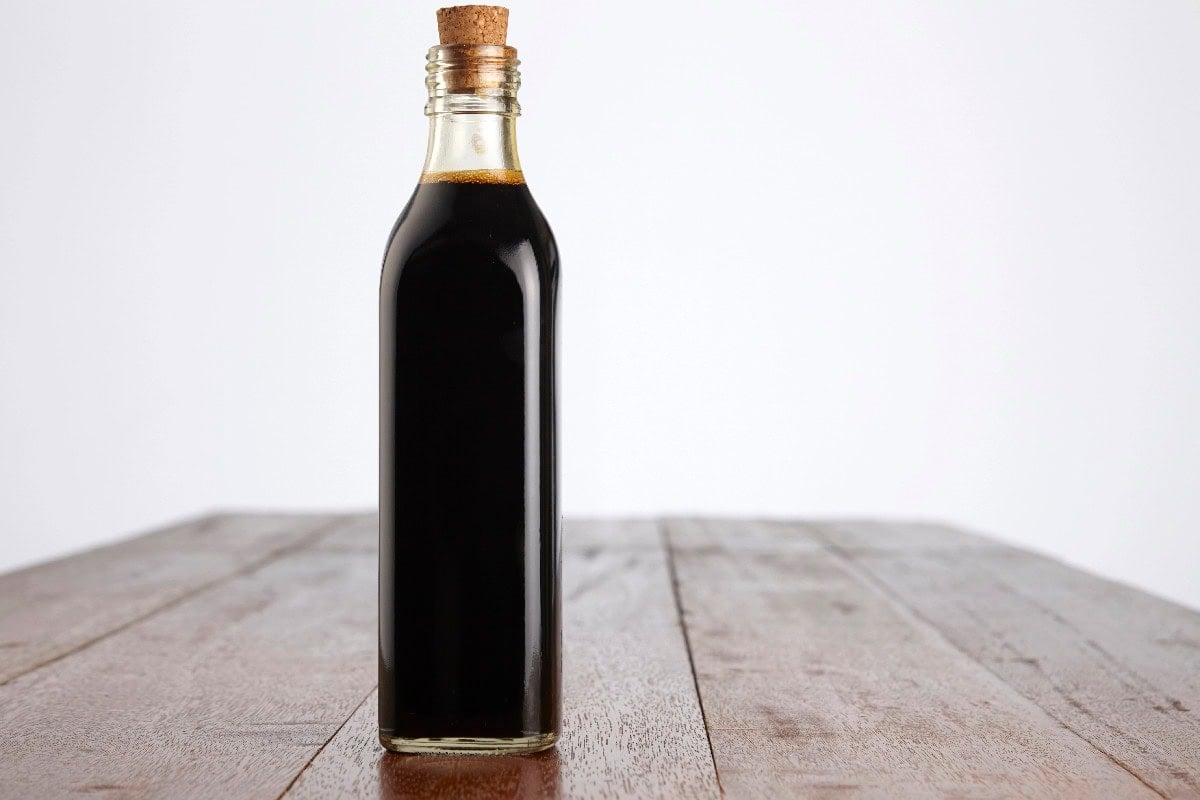 Bottle of black vinegar for comparing Chinese black vinegar substitutes.