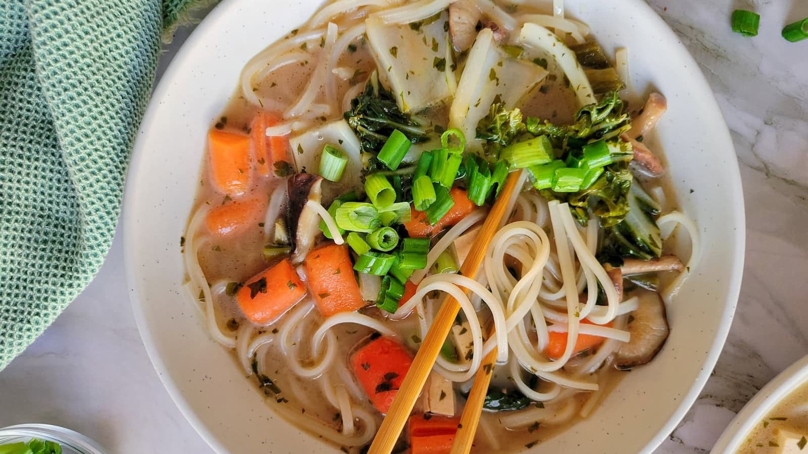 Hearty vegetable soup packed with fresh vegetables in a flavorful broth.