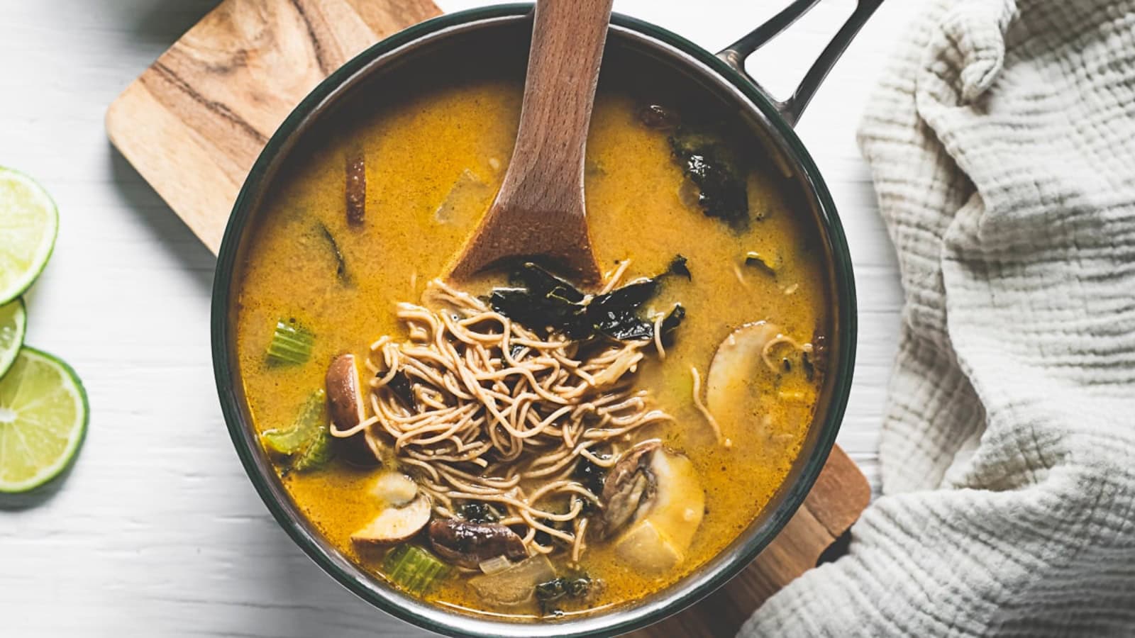 Creamy coconut soup infused with fresh lime and herbs.
