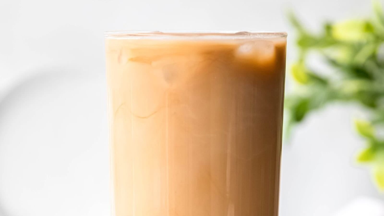 Iced coffee boba tea with creamy milk and tapioca pearls.