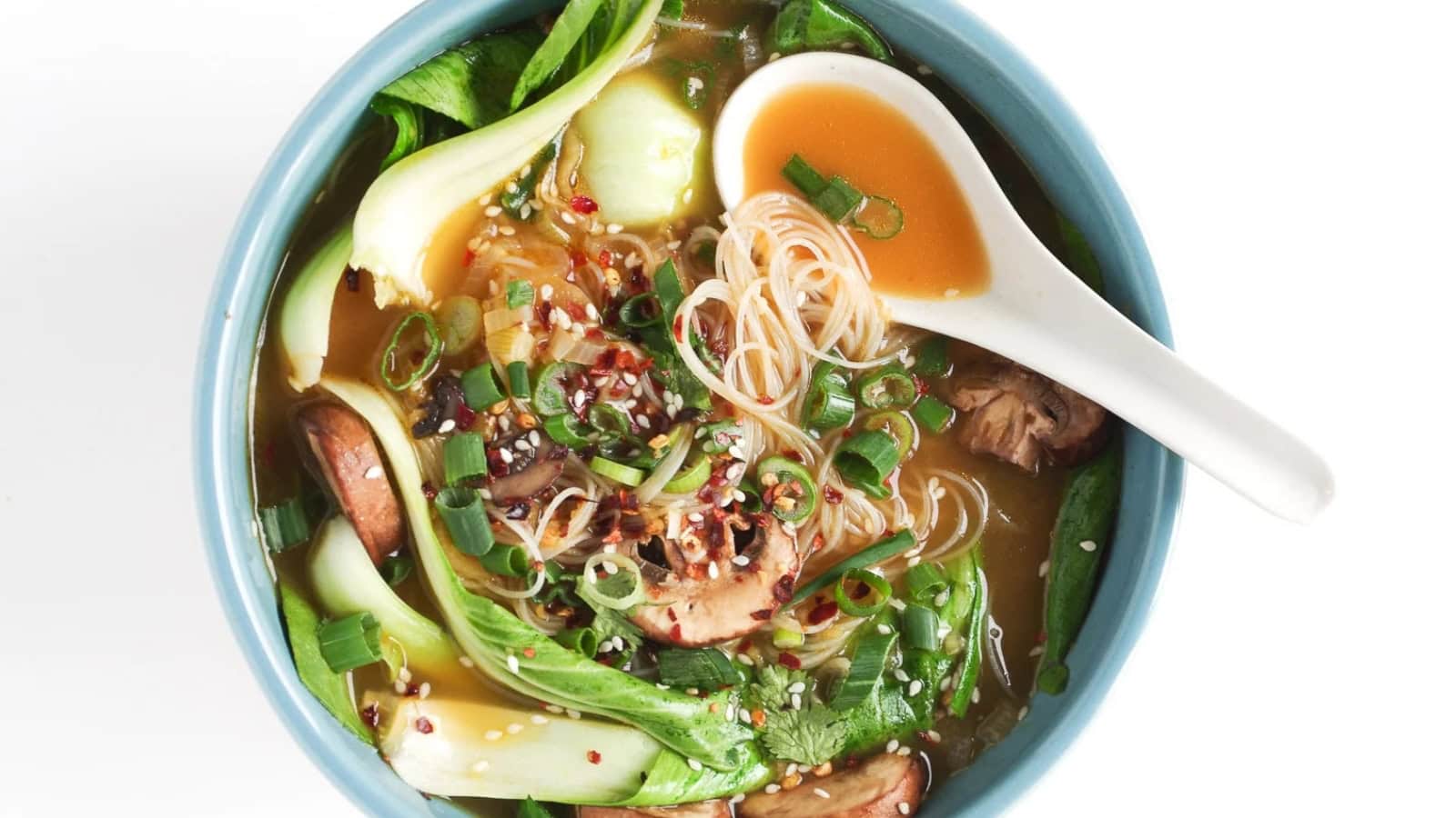 Noodle soup with ginger, garlic, bok choy, and savory broth.
