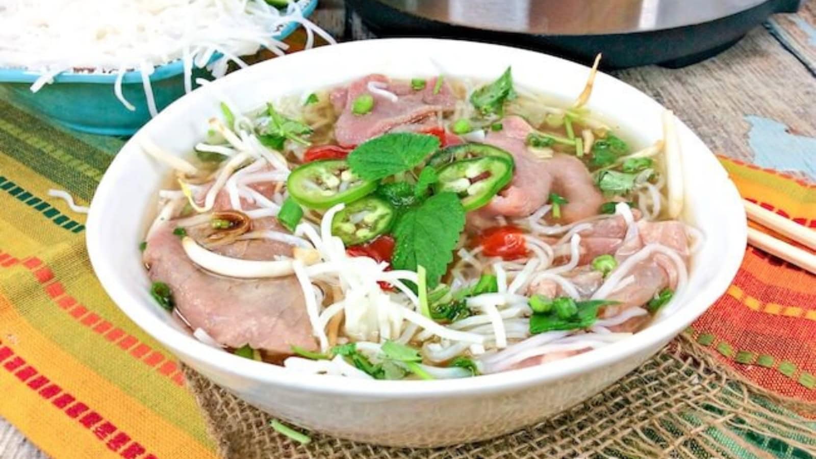 Instant Pot beef pho with tender beef and aromatic broth.