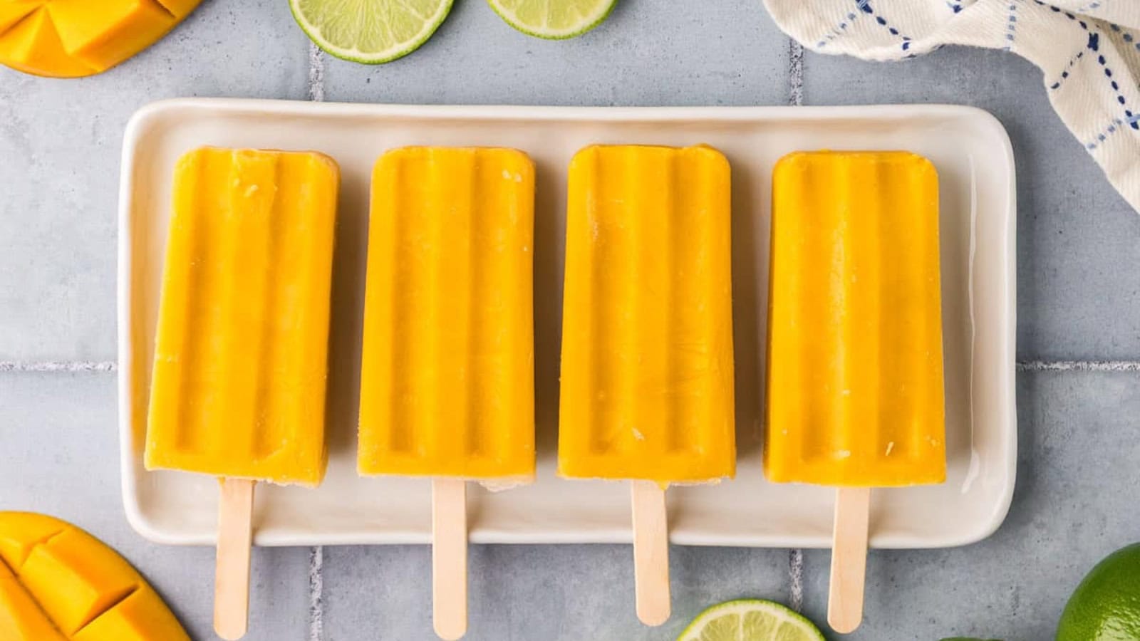 Refreshing mango popsicles made with ripe mangoes and simple ingredients.