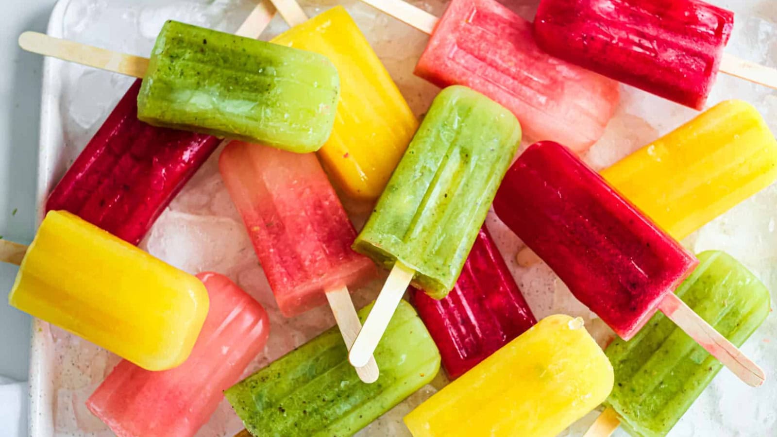 Colorful Mexican-style fruit paletas with fresh fruit flavors.