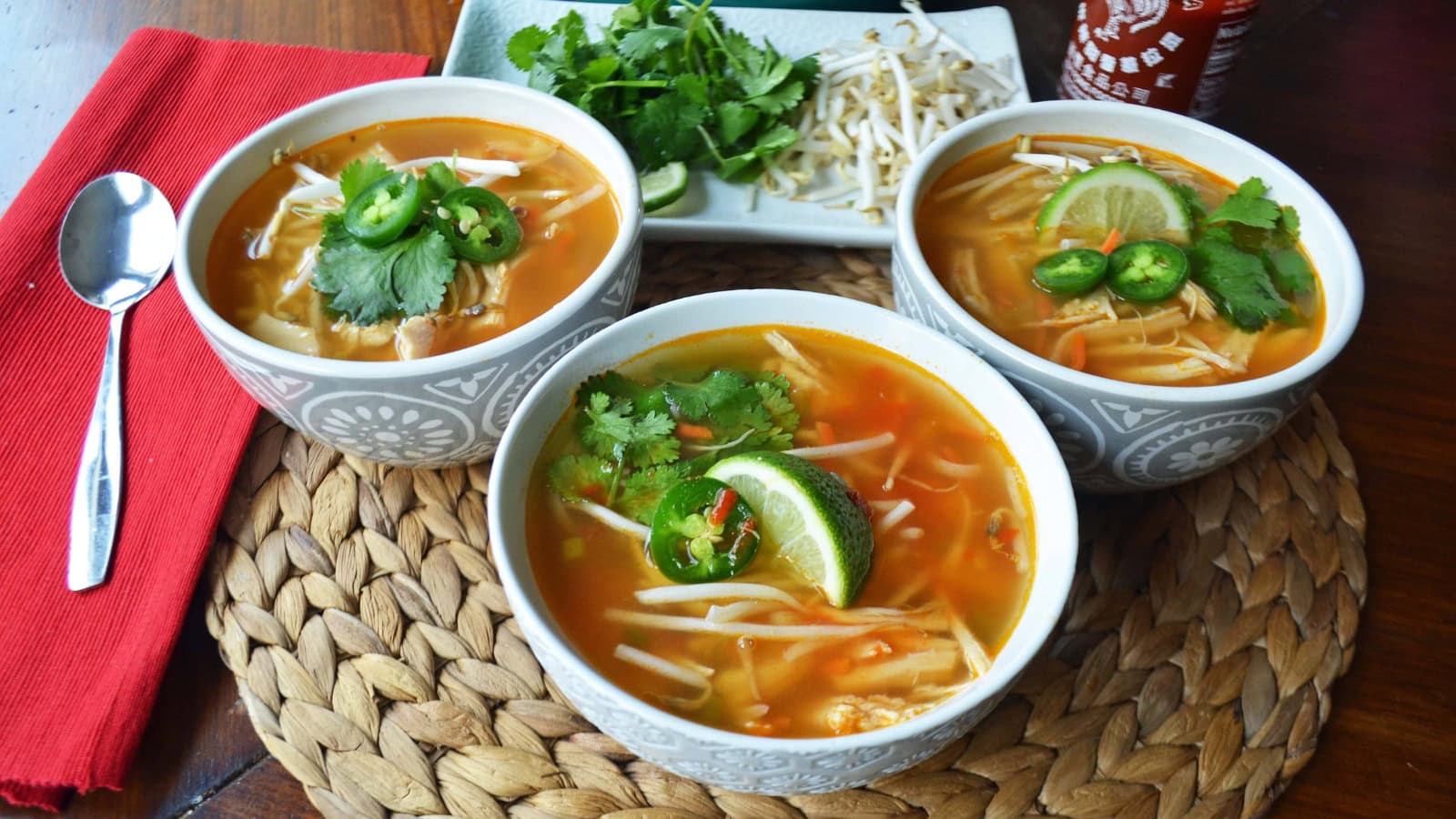 Chicken broth bowls with noodles, fresh herbs, and pho-inspired flavors.