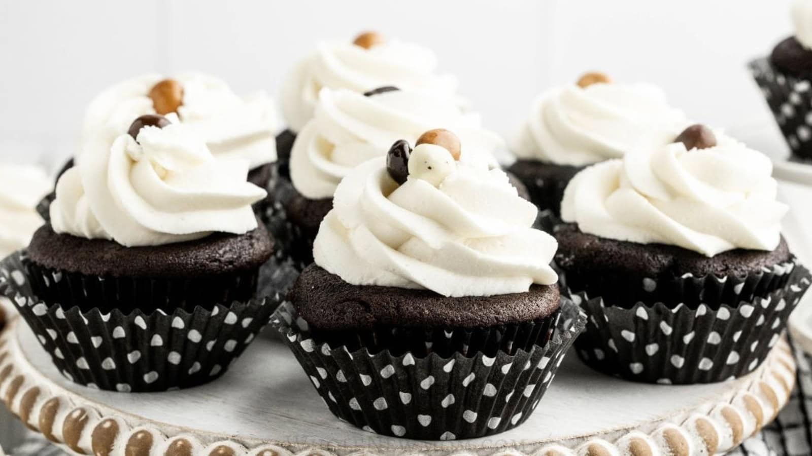 Soft gluten-free chocolate cupcakes topped with chocolate buttercream.