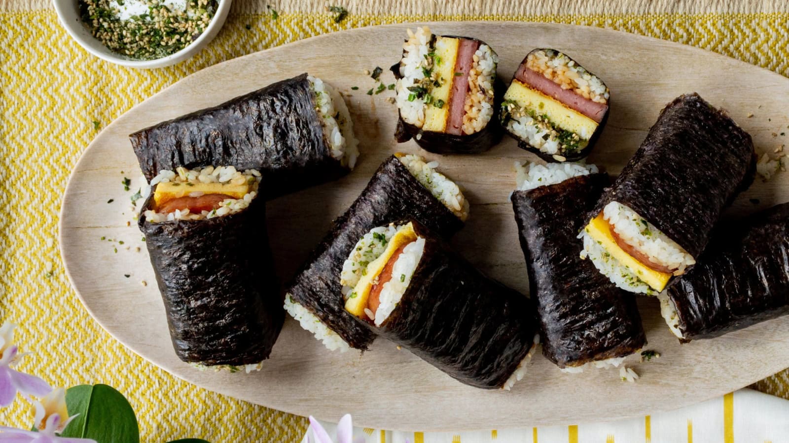Spam musubi wrapped with seaweed and brushed with teriyaki glaze.