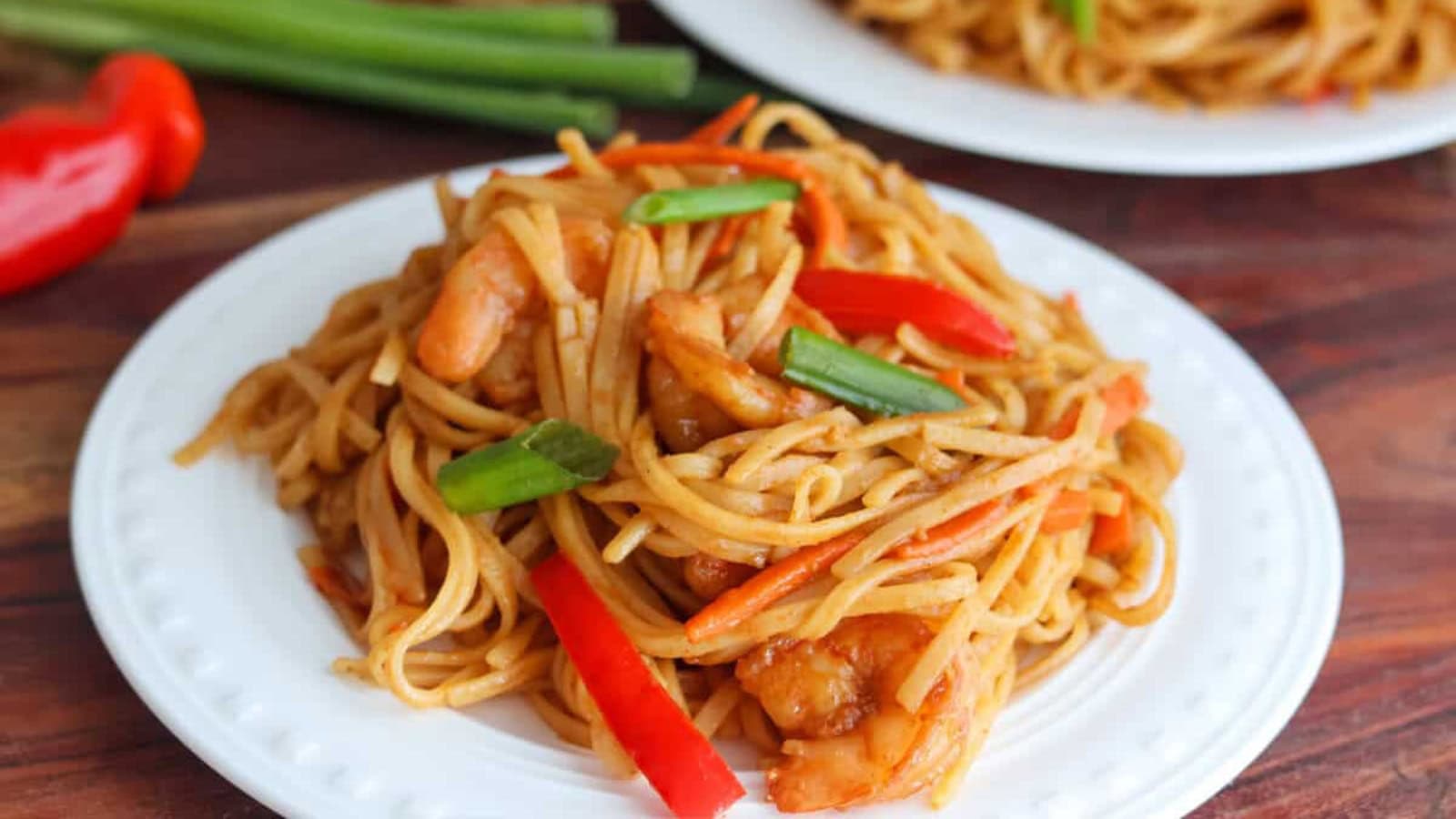 Teriyaki shrimp stir-fried with vegetables and served over rice.