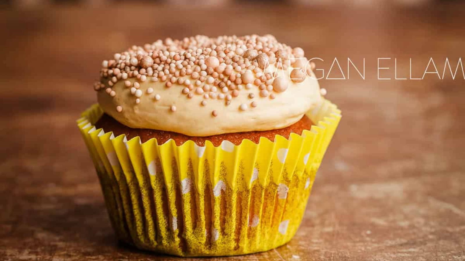 Keto cupcakes topped with creamy frosting and a light crumb.