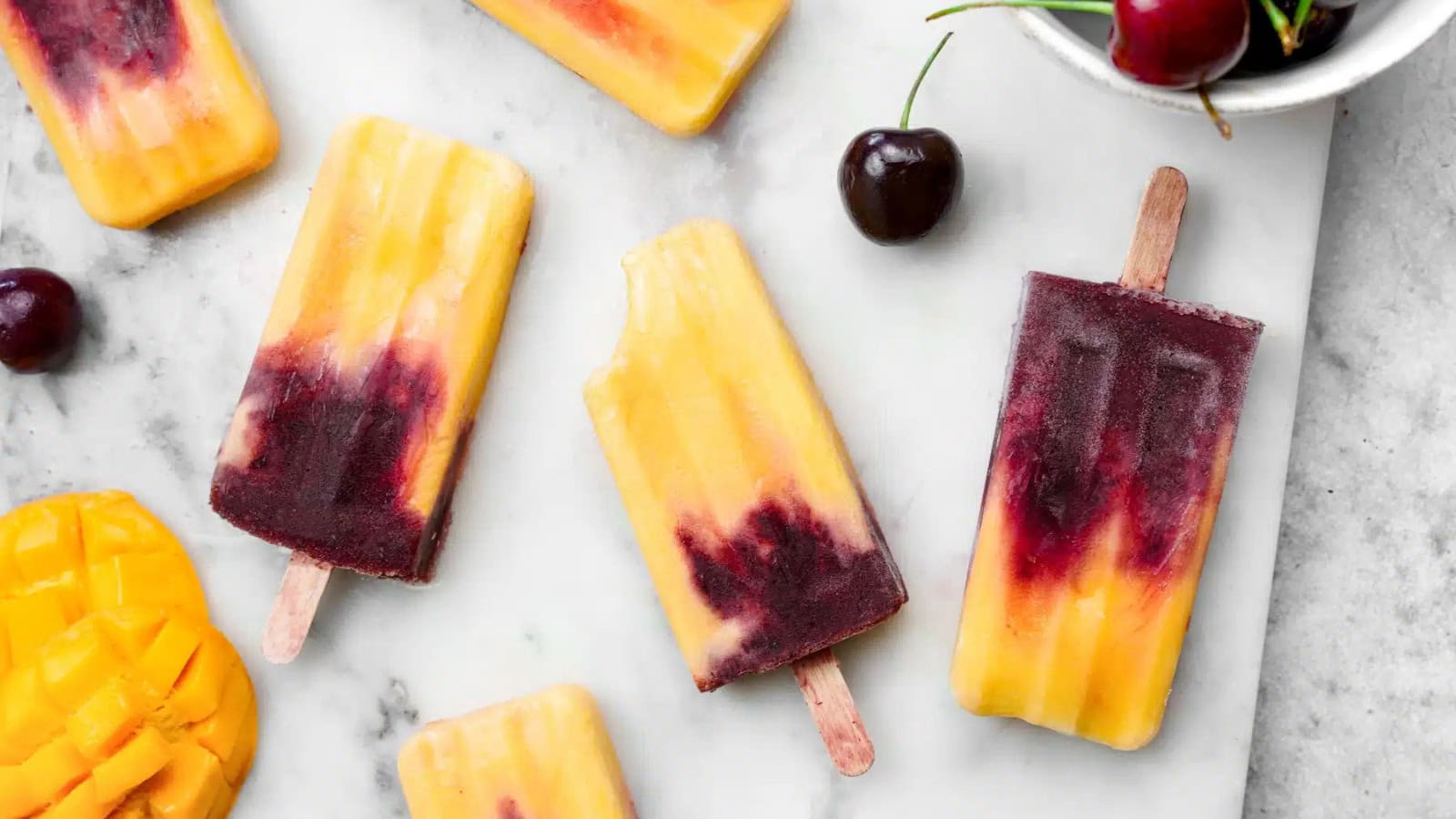 Fruity cherry mango popsicles with a naturally sweet taste.