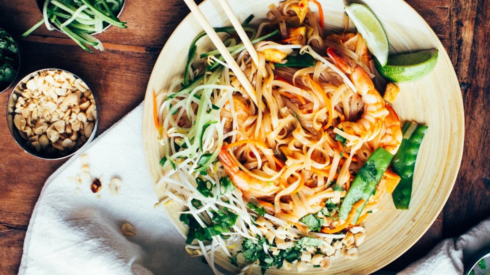 Rice noodles stir-fried with tofu, shrimp, and fresh vegetables.