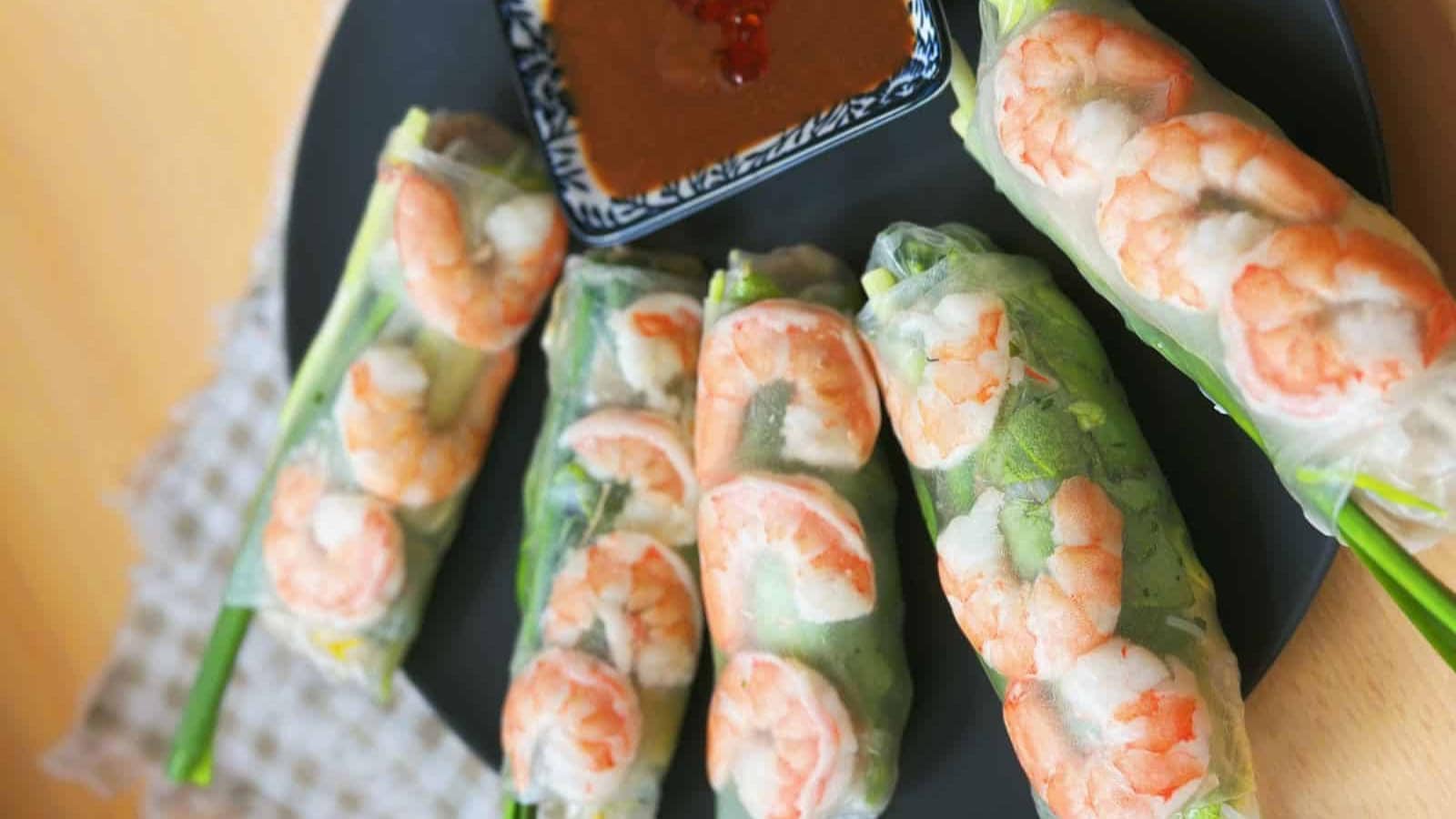 Fresh Vietnamese summer rolls filled with shrimp, herbs, and rice noodles.