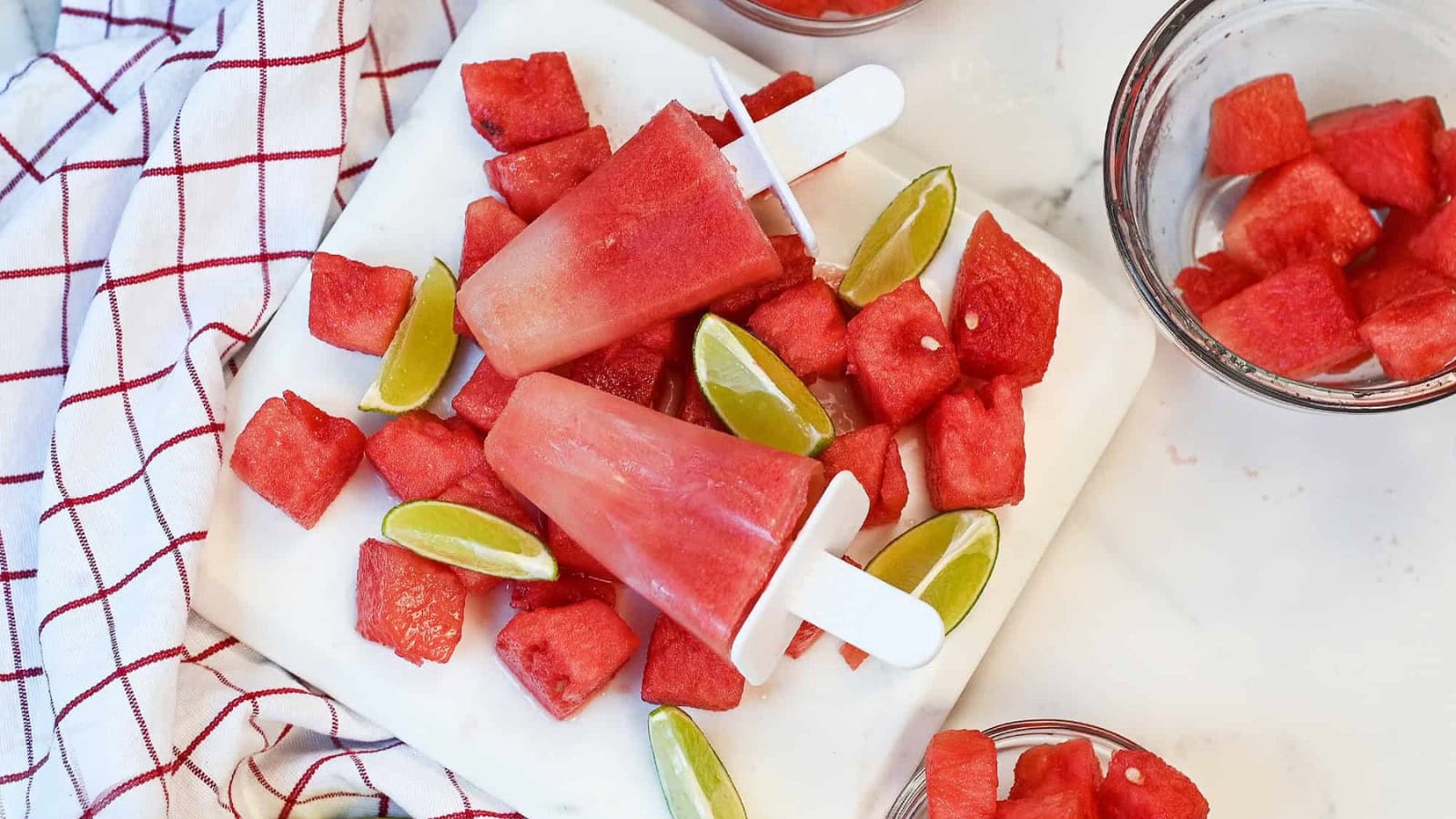 Watermelon lime popsicles with a refreshing sweet and tangy flavor.