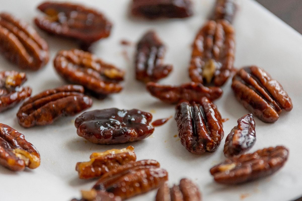 Close-up of freshly toasted pecans with a crisp, golden brown finish.