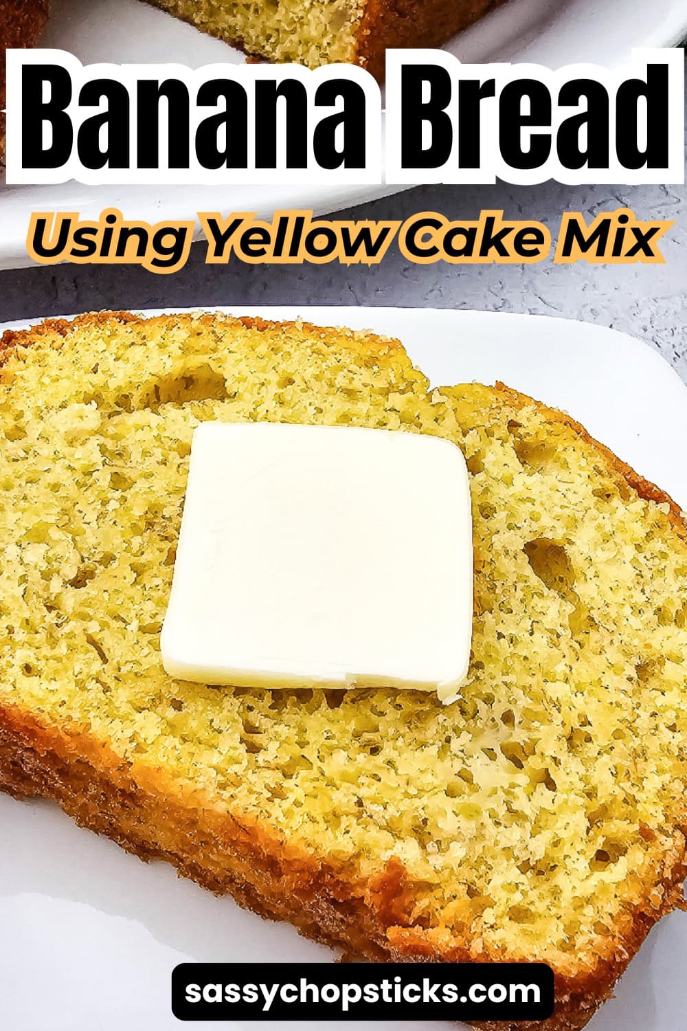 Banana bread using yellow cake mix topped with a pat of butter on a thick slice, ready to serve.