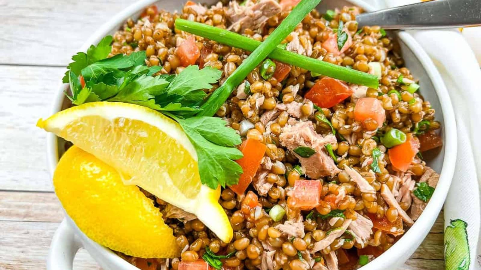 Wheat Berry Salad with Tomato & Tuna in a bowl.