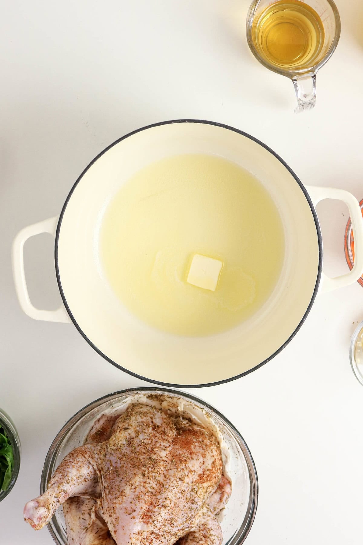 Butter melting in a Dutch oven before making chicken and orzo soup.