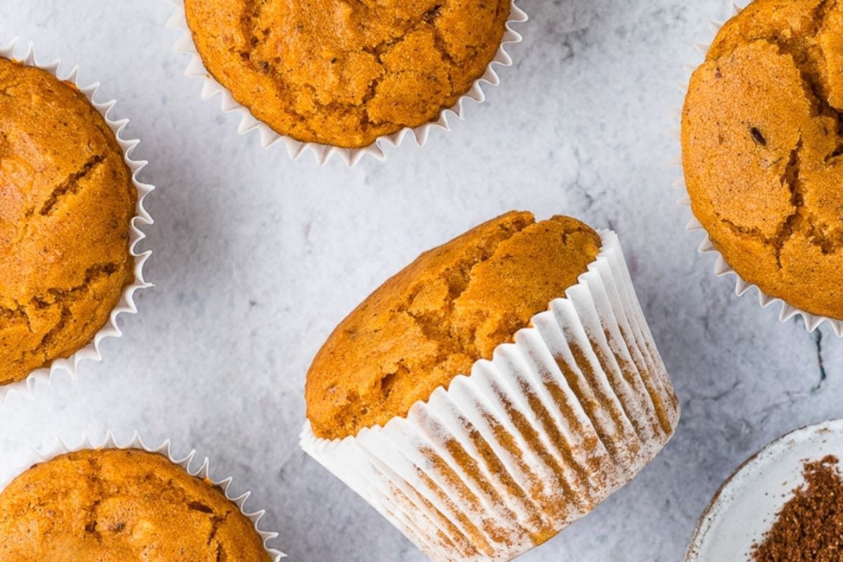 Soft gluten-free pumpkin muffins with a warmly spiced flavor.