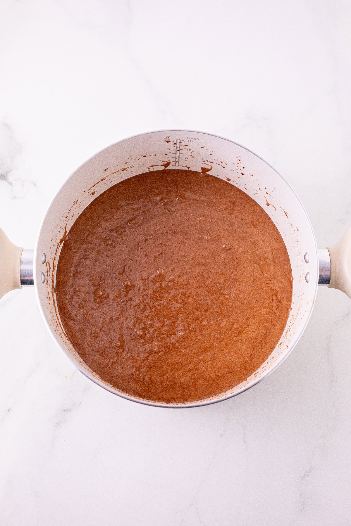 Melted chocolate marshmallow mixture in a pot.