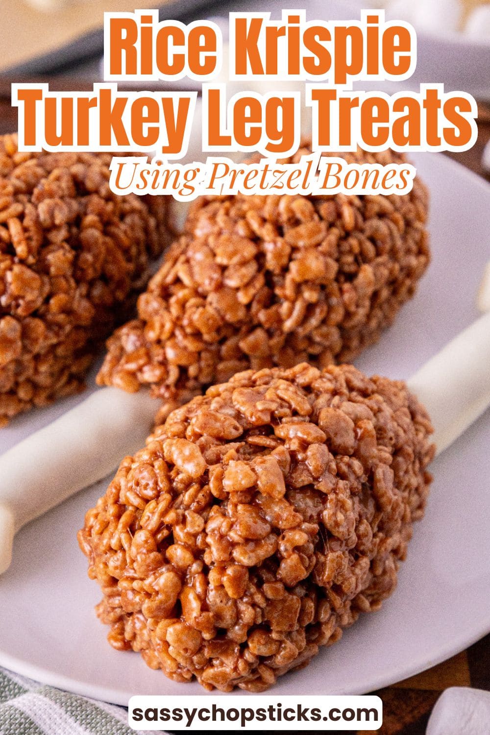 Rice Krispie turkey leg treats made with white chocolate pretzel bones.