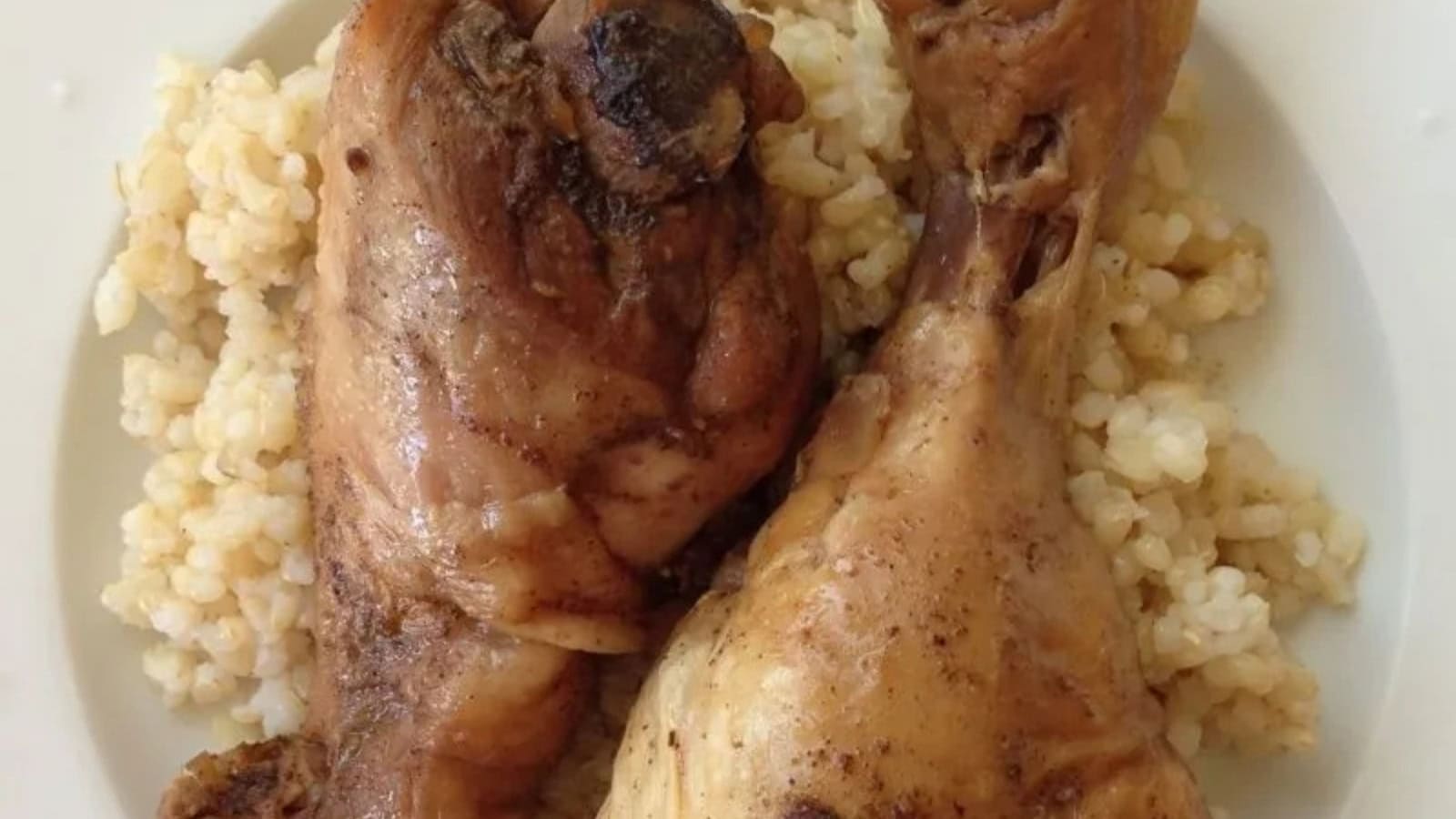 Slow-cooked chicken drumsticks glazed with five spice and soy sauce.