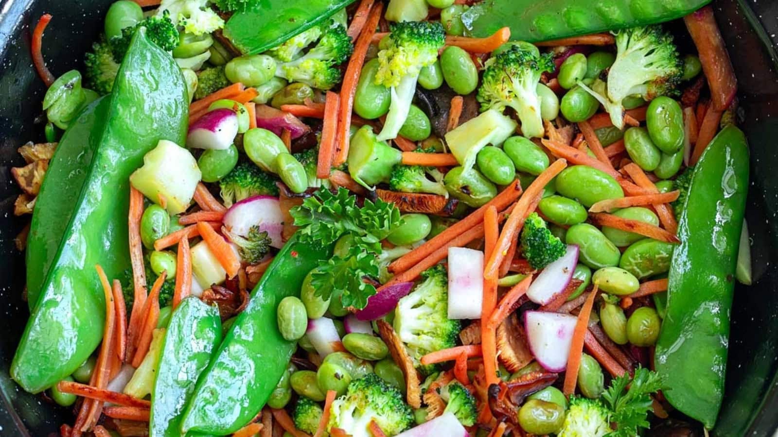 Crisp snow peas stir-fried with a light savory sauce.