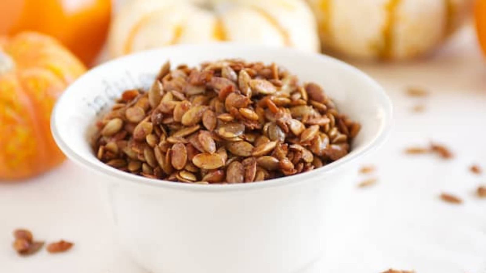 Roasted pumpkin seeds coated with maple syrup and Chinese five spice.