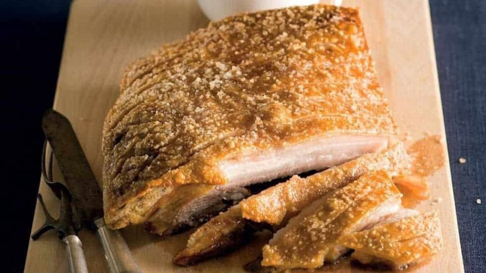 Roasted Kurobuta pork belly served with sweet apple sauce.