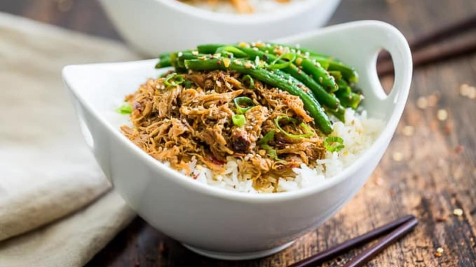 Tender pulled pork slow-cooked with Chinese five spice and savory seasonings.