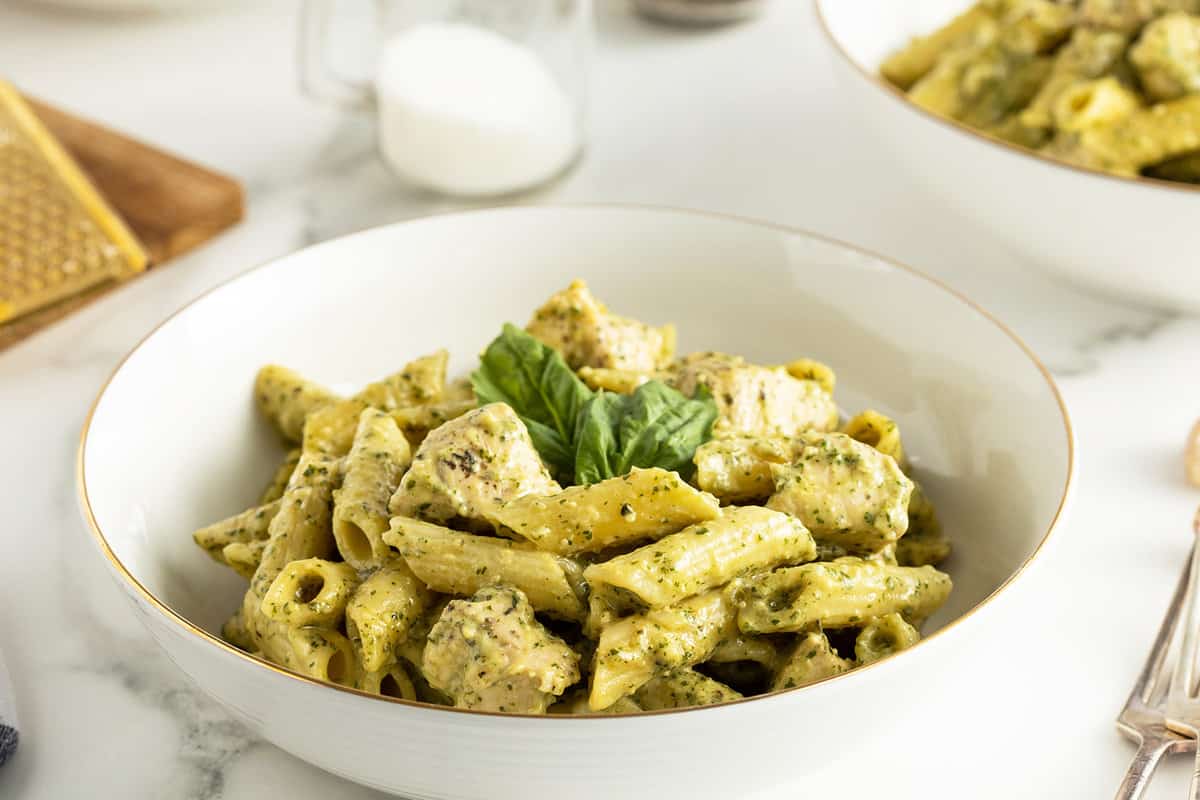 Tender chicken tossed with creamy pesto pasta.
