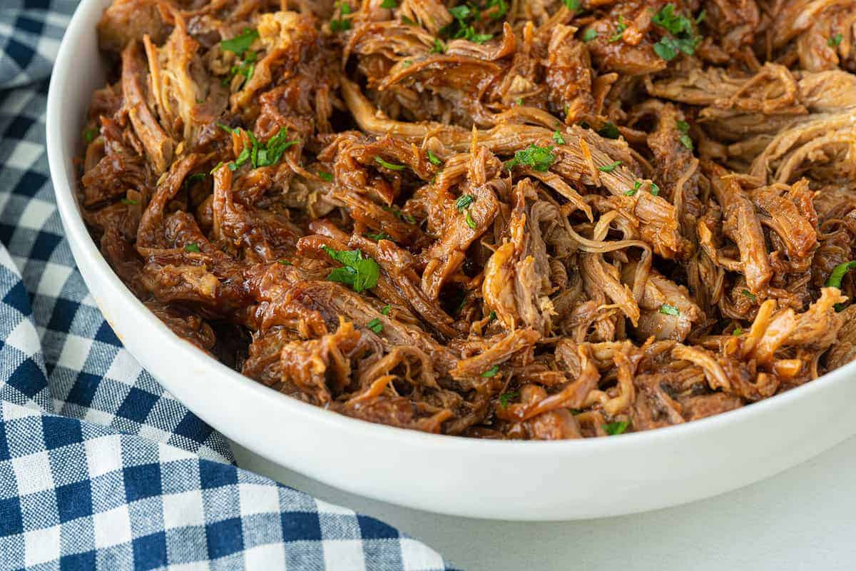 Pulled pork flavored with root beer.